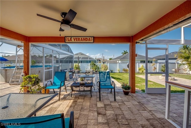 1812 SW 10th Ter, Cape Coral, FL 33991 - sunroom with ceiling fan and a residential view