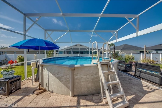 1812 SW 10th Ter, Cape Coral, FL 33991 - view of pool featuring glass enclosure and a patio