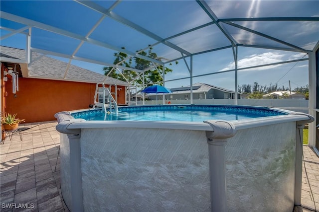 1812 SW 10th Ter, Cape Coral, FL 33991 - swimming pool with glass enclosure and a patio