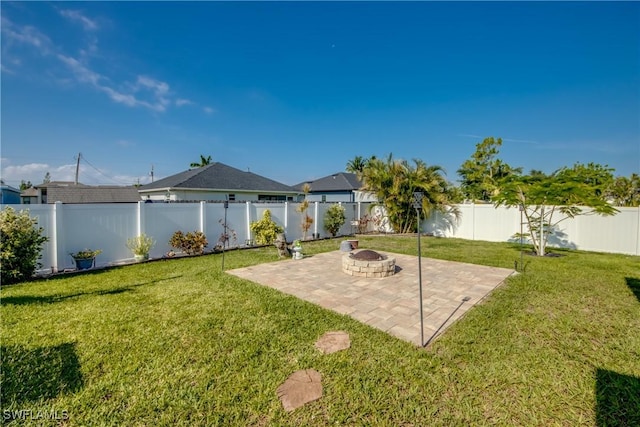 1812 SW 10th Ter, Cape Coral, FL 33991 - view of yard featuring a patio area and an outdoor fire pit
