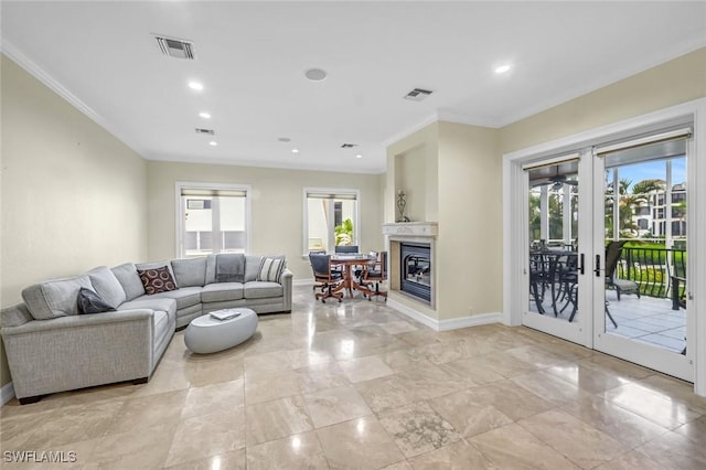 175 Topanga Dr, Bonita Springs, FL 34134 - living room featuring french doors, ornamental molding, baseboards, recessed lighting, and a glass covered fireplace