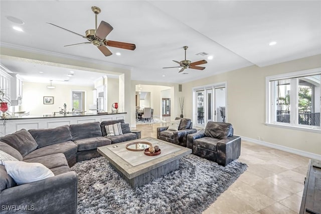 175 Topanga Dr, Bonita Springs, FL 34134 - living room featuring a ceiling fan, baseboards, crown molding, recessed lighting, and light tile patterned floors