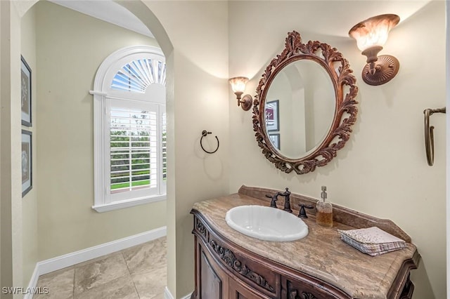175 Topanga Dr, Bonita Springs, FL 34134 - bathroom featuring baseboards and vanity