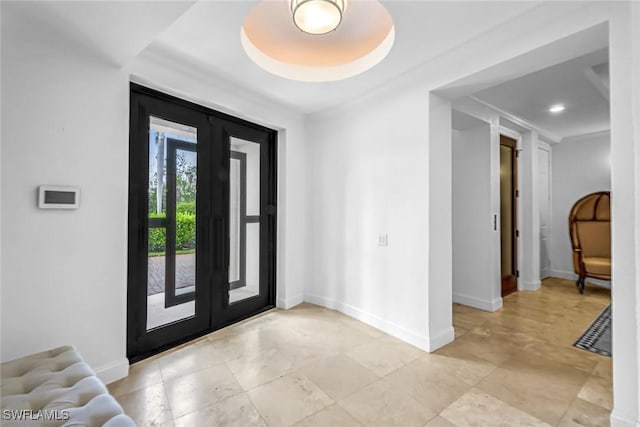 175 Topanga Dr, Bonita Springs, FL 34134 - entrance foyer featuring baseboards and french doors