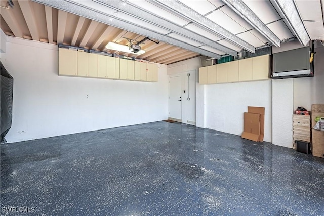 175 Topanga Dr, Bonita Springs, FL 34134 - garage featuring a garage door opener