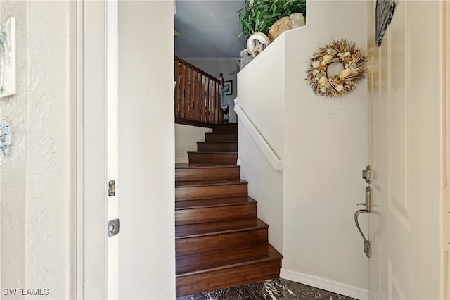 24712 Lakemont Cove Ln Unit 202, Bonita Springs, FL 34134 - stairs featuring baseboards and marble finish flooring