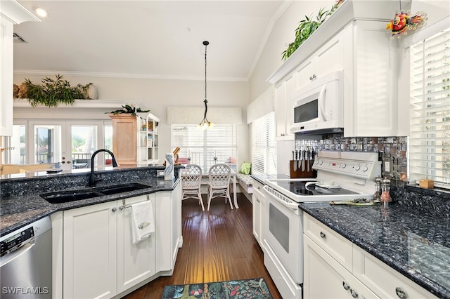 24712 Lakemont Cove Ln Unit 202, Bonita Springs, FL 34134 - kitchen with white appliances, a sink, crown molding, and plenty of natural light