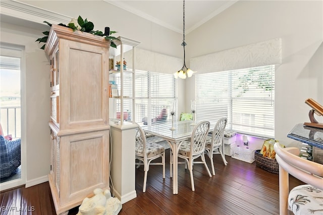 24712 Lakemont Cove Ln Unit 202, Bonita Springs, FL 34134 - dining space featuring ornamental molding, plenty of natural light, and dark wood-type flooring