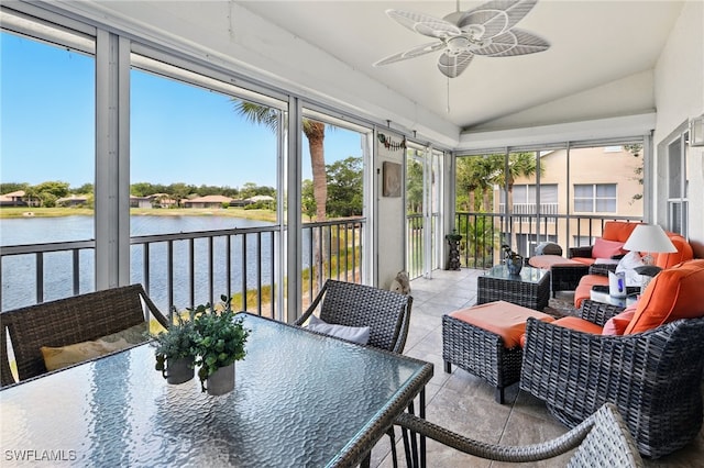 24712 Lakemont Cove Ln Unit 202, Bonita Springs, FL 34134 - sunroom / solarium featuring a water view, lofted ceiling, and ceiling fan