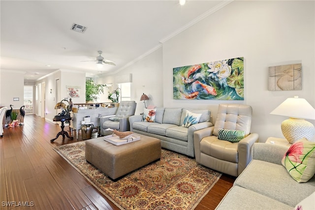 24712 Lakemont Cove Ln Unit 202, Bonita Springs, FL 34134 - living area with dark wood-style floors, crown molding, ceiling fan, vaulted ceiling, and baseboards