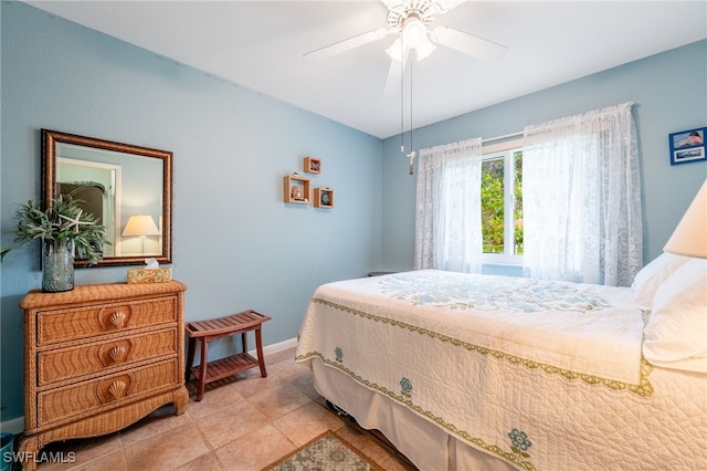 4559 Springview Cir, Labelle, FL 33935 - bedroom with a ceiling fan, light tile patterned floors, and baseboards