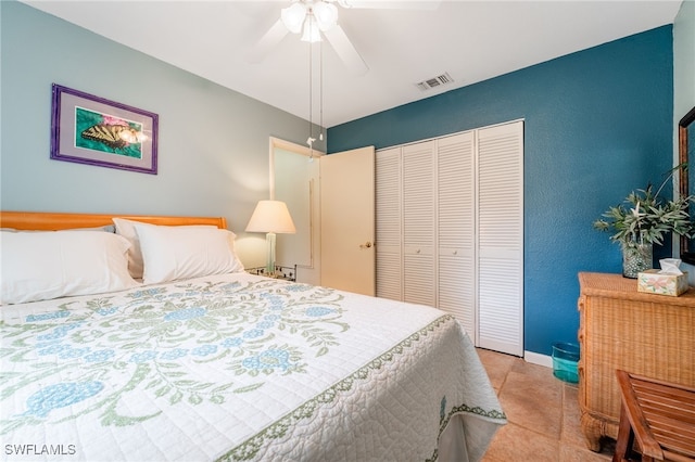 4559 Springview Cir, Labelle, FL 33935 - bedroom with a closet, light tile patterned floors, and a ceiling fan