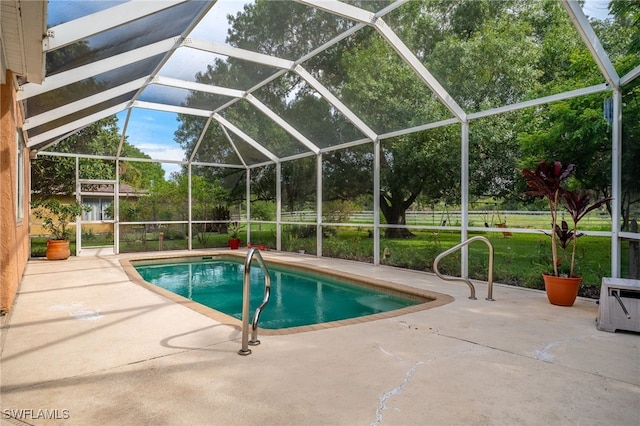 4559 Springview Cir, Labelle, FL 33935 - swimming pool with a patio and glass enclosure
