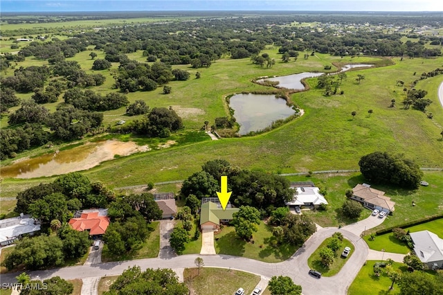 4559 Springview Cir, Labelle, FL 33935 - aerial view of property's location featuring a nearby body of water and nearby suburban area