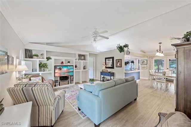 180 20th St SE, Naples, FL 34117 - living area featuring ceiling fan, lofted ceiling, light wood-style flooring, baseboards, and crown molding
