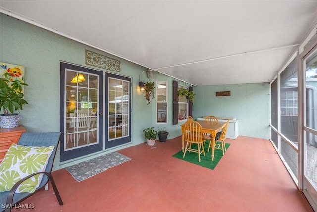 180 20th St SE, Naples, FL 34117 - sunroom / solarium with french doors, healthy amount of natural light, and outdoor dining area