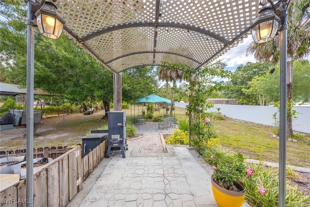 180 20th St SE, Naples, FL 34117 - fenced backyard with a patio area