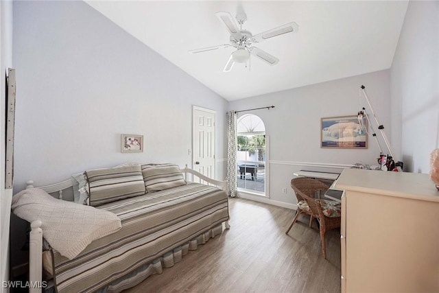 180 20th St SE, Naples, FL 34117 - bedroom with light wood-style floors, lofted ceiling, baseboards, a ceiling fan, and a closet