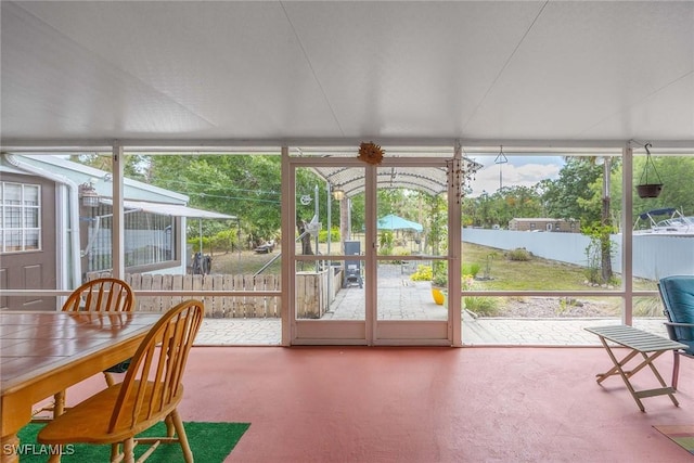 180 20th St SE, Naples, FL 34117 - sunroom featuring plenty of natural light