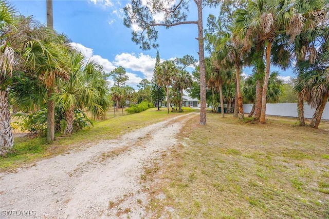 180 20th St SE, Naples, FL 34117 - view of dirt / gravel driveway