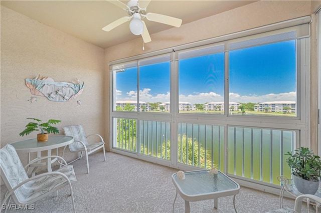 14121 Brant Point Cir Unit 1403, Fort Myers, FL 33919 - sunroom / solarium featuring ceiling fan, healthy amount of natural light, and a water view
