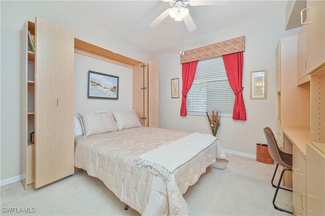 14121 Brant Point Cir Unit 1403, Fort Myers, FL 33919 - bedroom with light carpet, an office area, baseboards, and a ceiling fan