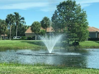 14121 Brant Point Cir Unit 1403, Fort Myers, FL 33919 - surrounding community featuring a water view and a yard