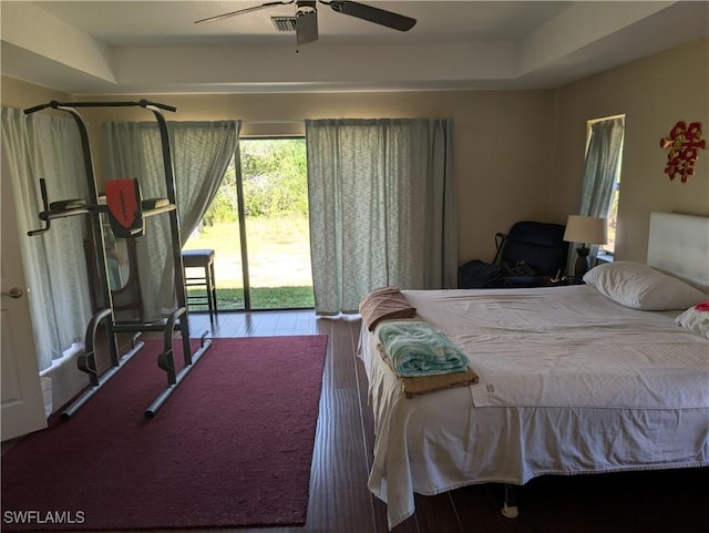 41300 Horseshoe Rd, Punta Gorda, FL 33982 - bedroom with access to outside, wood finished floors, and ceiling fan