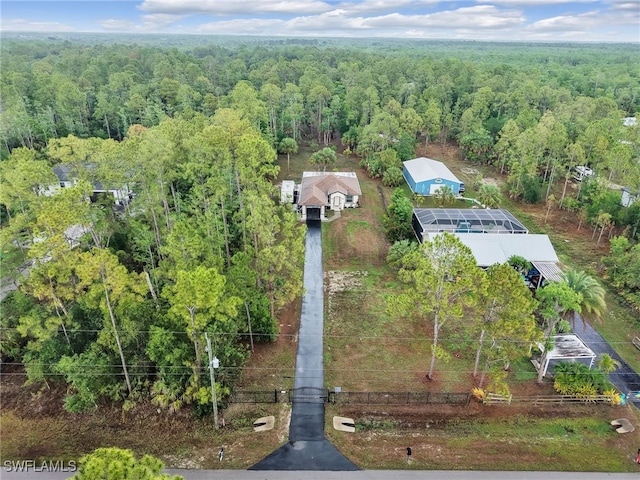 145 33rd Ave NE, Naples, FL 34120 - aerial view of a heavily wooded area