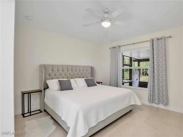 145 33rd Ave NE, Naples, FL 34120 - bedroom featuring baseboards and ceiling fan