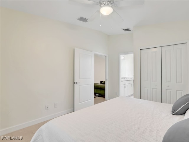 145 33rd Ave NE, Naples, FL 34120 - bedroom with a closet, baseboards, a ceiling fan, and ensuite bathroom