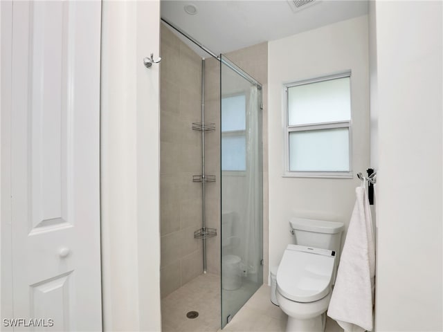 145 33rd Ave NE, Naples, FL 34120 - bathroom with toilet and a shower stall