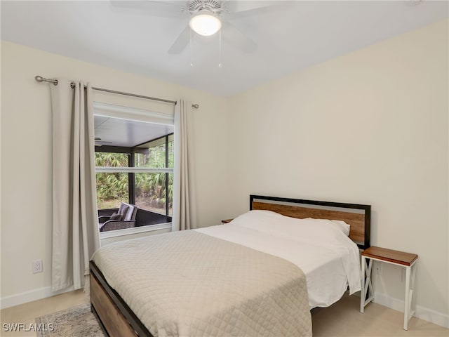 145 33rd Ave NE, Naples, FL 34120 - bedroom with baseboards and a ceiling fan
