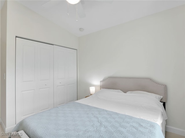 145 33rd Ave NE, Naples, FL 34120 - bedroom featuring a closet, ceiling fan, and baseboards