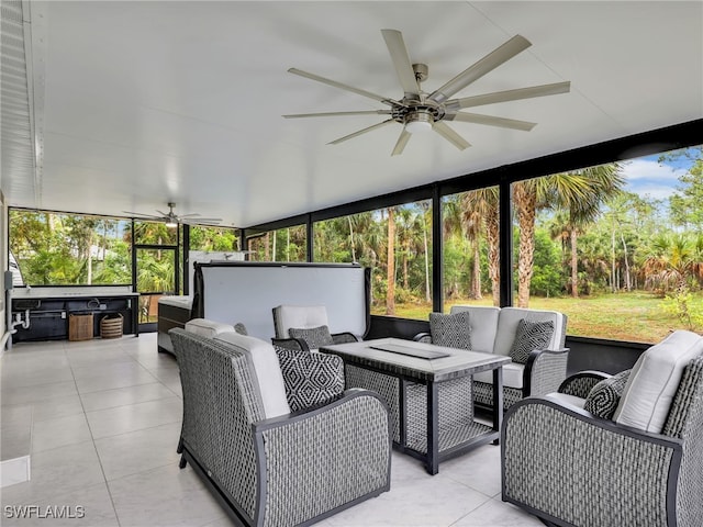145 33rd Ave NE, Naples, FL 34120 - sunroom with ceiling fan, an outdoor hangout area, and plenty of natural light