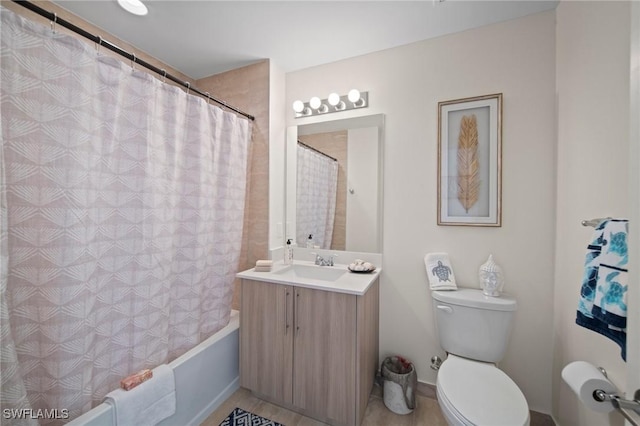 15901 Royal Pointe Ln Unit 301, Fort Myers, FL 33908 - bathroom with toilet, vanity, and shower / tub combo with curtain