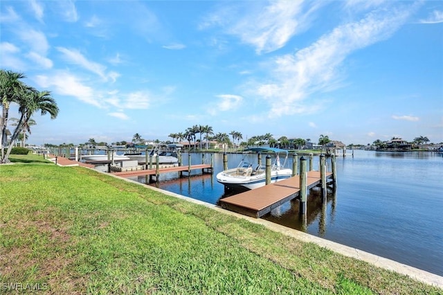 1829 SE 41st St Unit 1I, Cape Coral, FL 33904 - dock area with a lawn and a water view