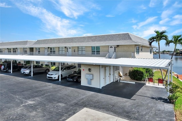 1829 SE 41st St Unit 1I, Cape Coral, FL 33904 - view of covered parking lot