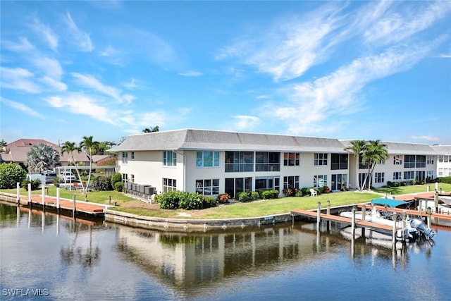 1829 SE 41st St Unit 1I, Cape Coral, FL 33904 - water view featuring a boat dock, nearby suburban area, and boat lift