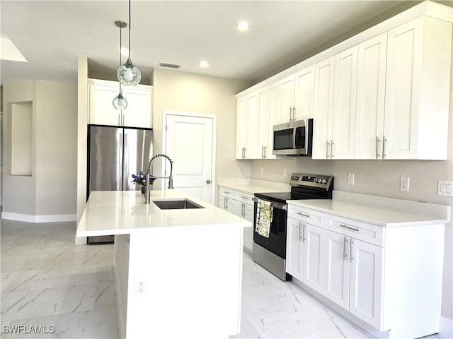222 Victoria Ave S, Lehigh Acres, FL 33974 - kitchen with appliances with stainless steel finishes, a sink, light marble finish flooring, recessed lighting, and baseboards