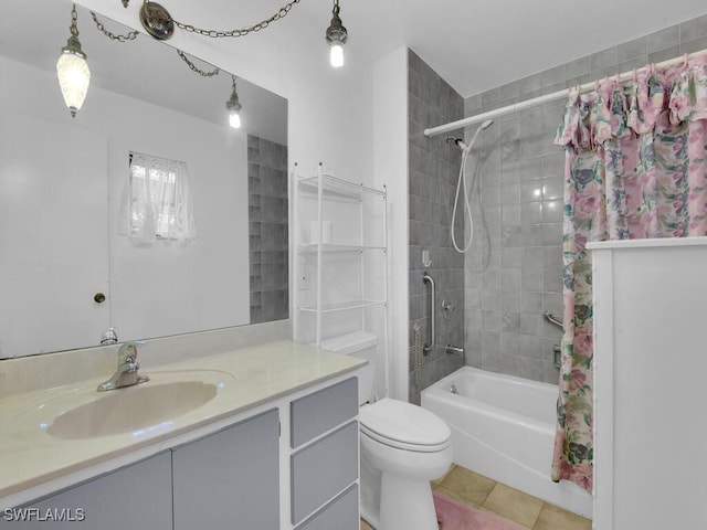 333 SE 33rd Ter, Cape Coral, FL 33904 - full bathroom featuring shower / tub combo, vanity, tile patterned floors, and toilet