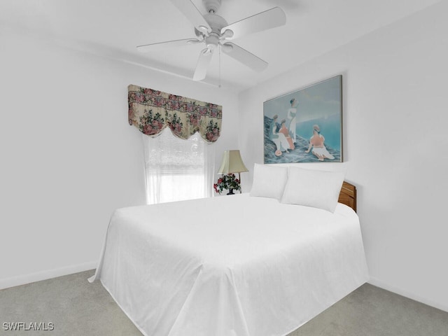 333 SE 33rd Ter, Cape Coral, FL 33904 - bedroom featuring carpet floors, baseboards, and a ceiling fan