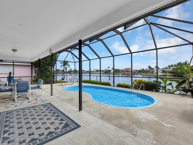 333 SE 33rd Ter, Cape Coral, FL 33904 - swimming pool featuring a patio, a water view, and a lanai