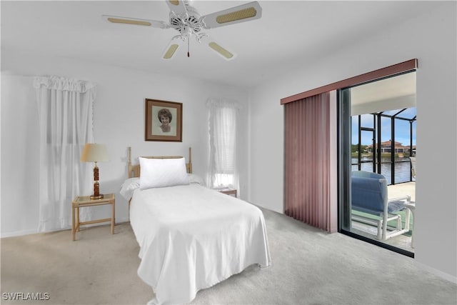 333 SE 33rd Ter, Cape Coral, FL 33904 - bedroom with access to exterior, carpet flooring, a ceiling fan, and a water view