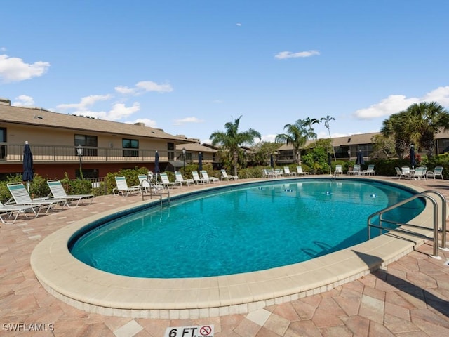 207 S Collier Blvd Unit 4-105, Marco Island, FL 34145 - community pool with a patio area