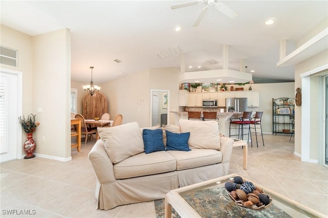 3708 SW 2nd Ln, Cape Coral, FL 33991 - living area with light tile patterned floors, vaulted ceiling, a chandelier, ceiling fan, and recessed lighting