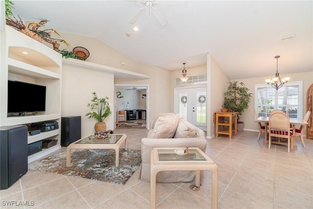 3708 SW 2nd Ln, Cape Coral, FL 33991 - tiled living area featuring a ceiling fan, vaulted ceiling, and a chandelier
