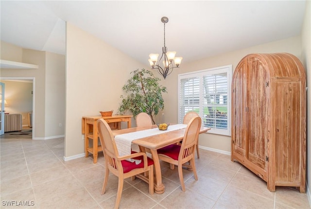 3708 SW 2nd Ln, Cape Coral, FL 33991 - dining space with a chandelier, light tile patterned floors, baseboards, and radiator heating unit