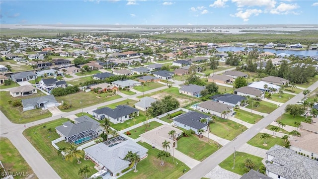 3708 SW 2nd Ln, Cape Coral, FL 33991 - aerial view of property and surrounding area featuring a nearby body of water and nearby suburban area