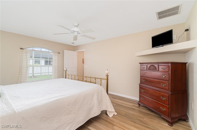 3708 SW 2nd Ln, Cape Coral, FL 33991 - bedroom featuring light wood finished floors, baseboards, and ceiling fan